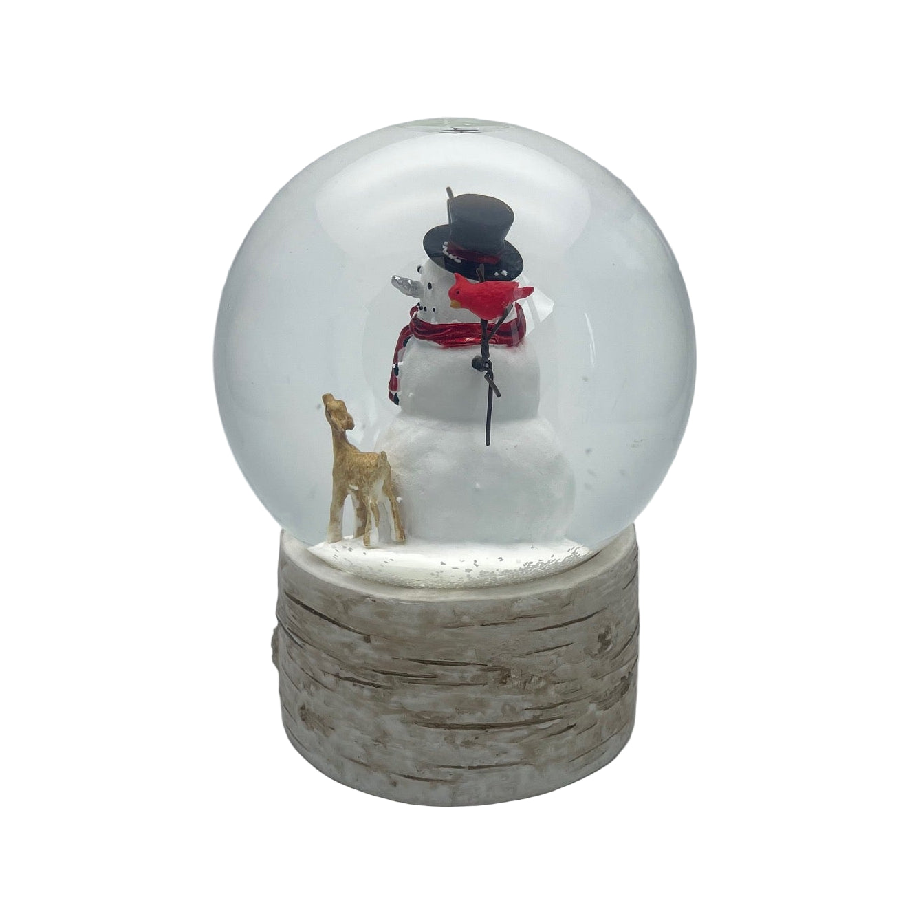 Snow globe with a snowman and dog inside on a wooden base against a white background