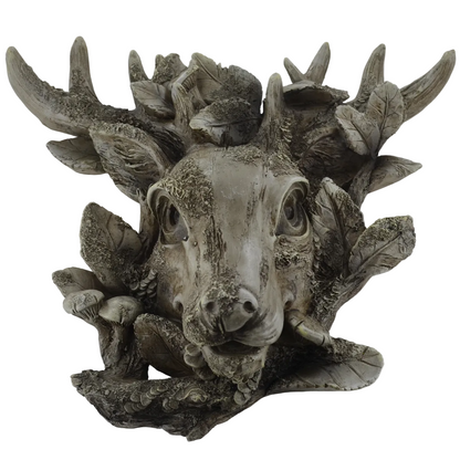 A detailed fantasy deer head wall sculpture with textured bark, leaves, and antlers, shown against a plain light gray background.
