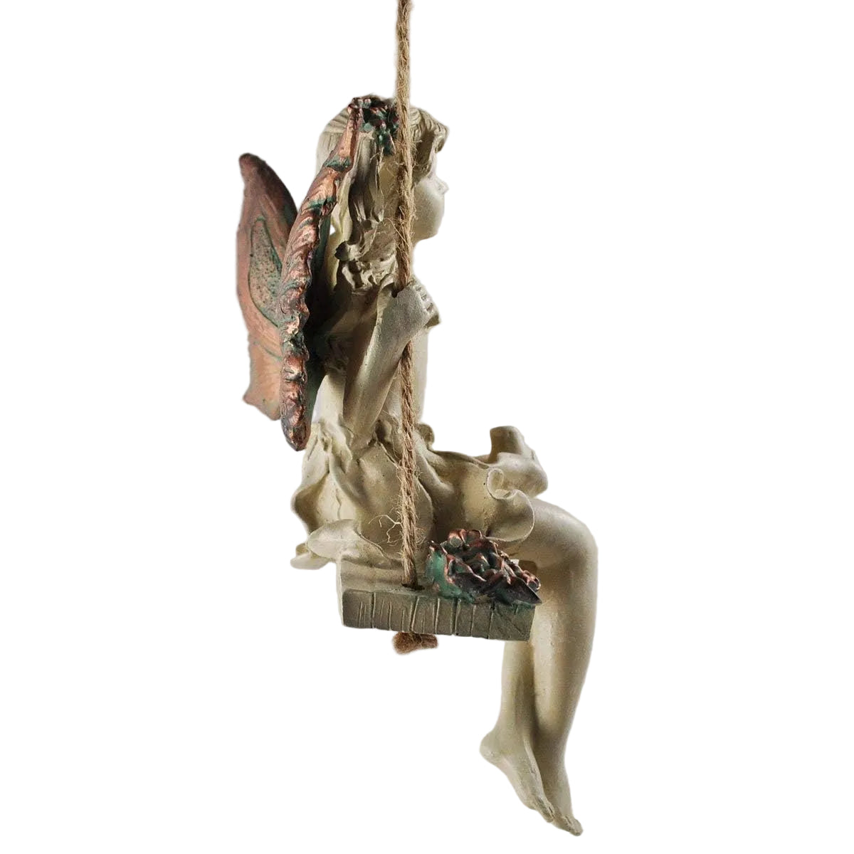 Decorative fairy figurine with wings on a swing against a plain background