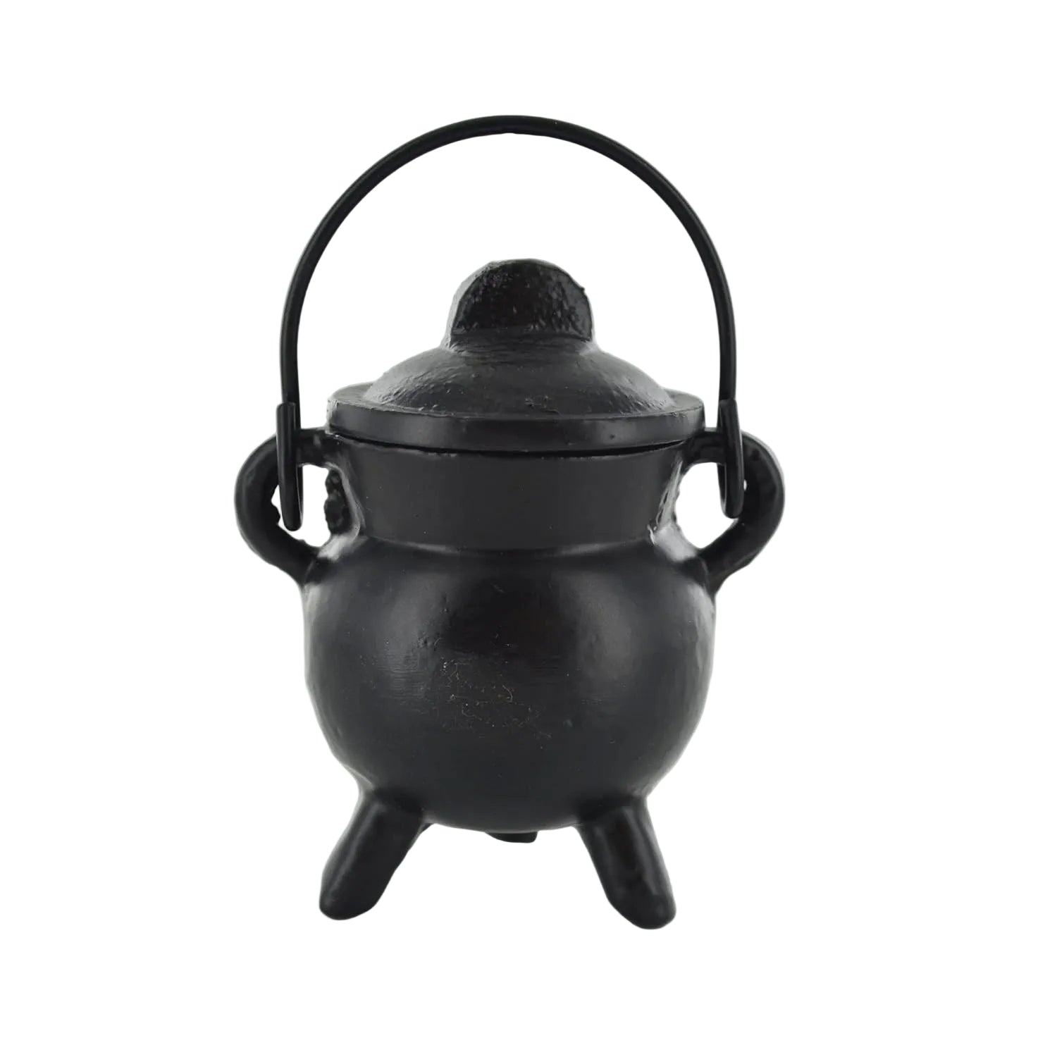 Black cast iron cauldron with lid on a white background