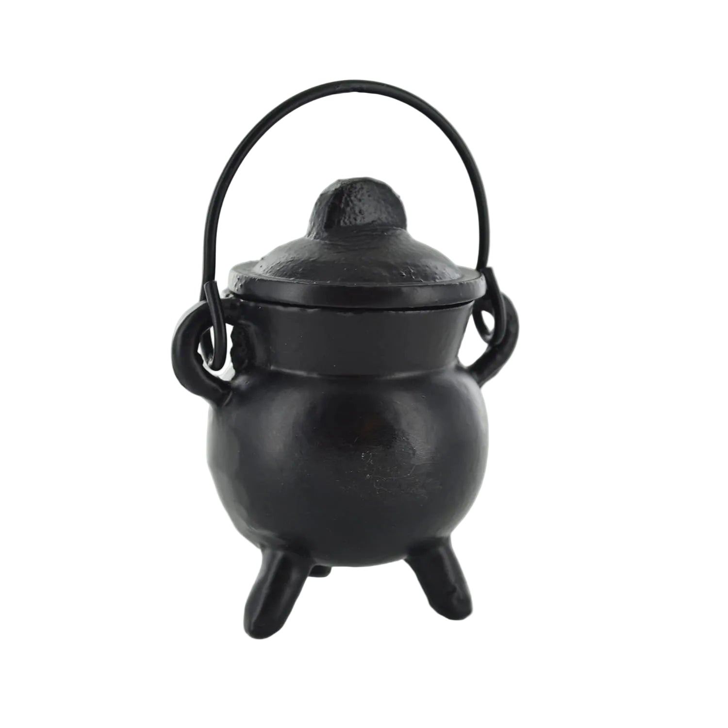 Black cast iron cauldron with lid on a white background
