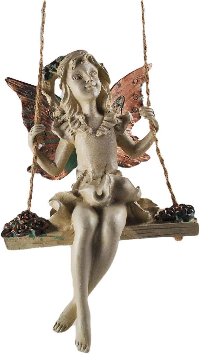Fairy figurine sitting on a swing with detailed wings and hair.