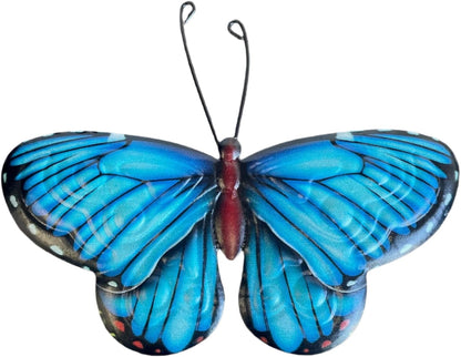 Blue butterfly with red accents on a white background