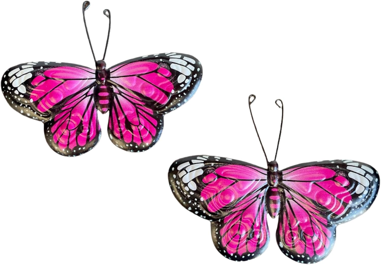 Two pink butterflies with black and white accents on a white background