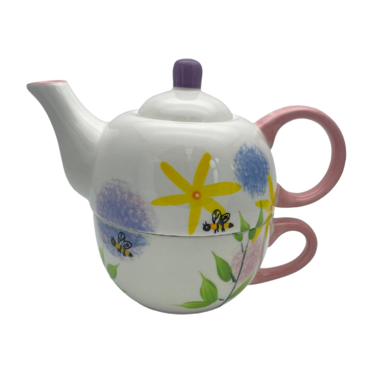 Ceramic teapot with floral design on a white background