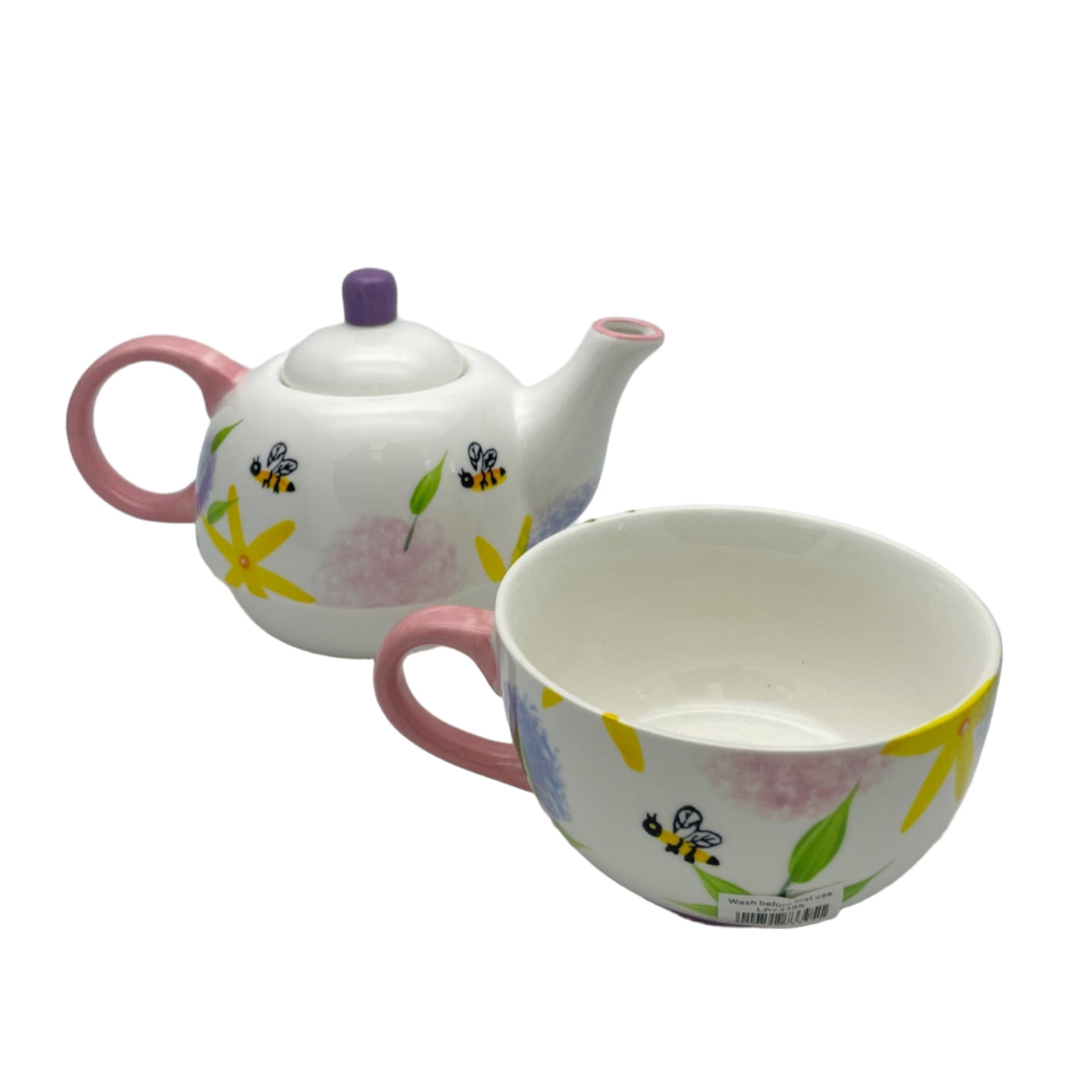 Two ceramic cups with floral designs on a white background