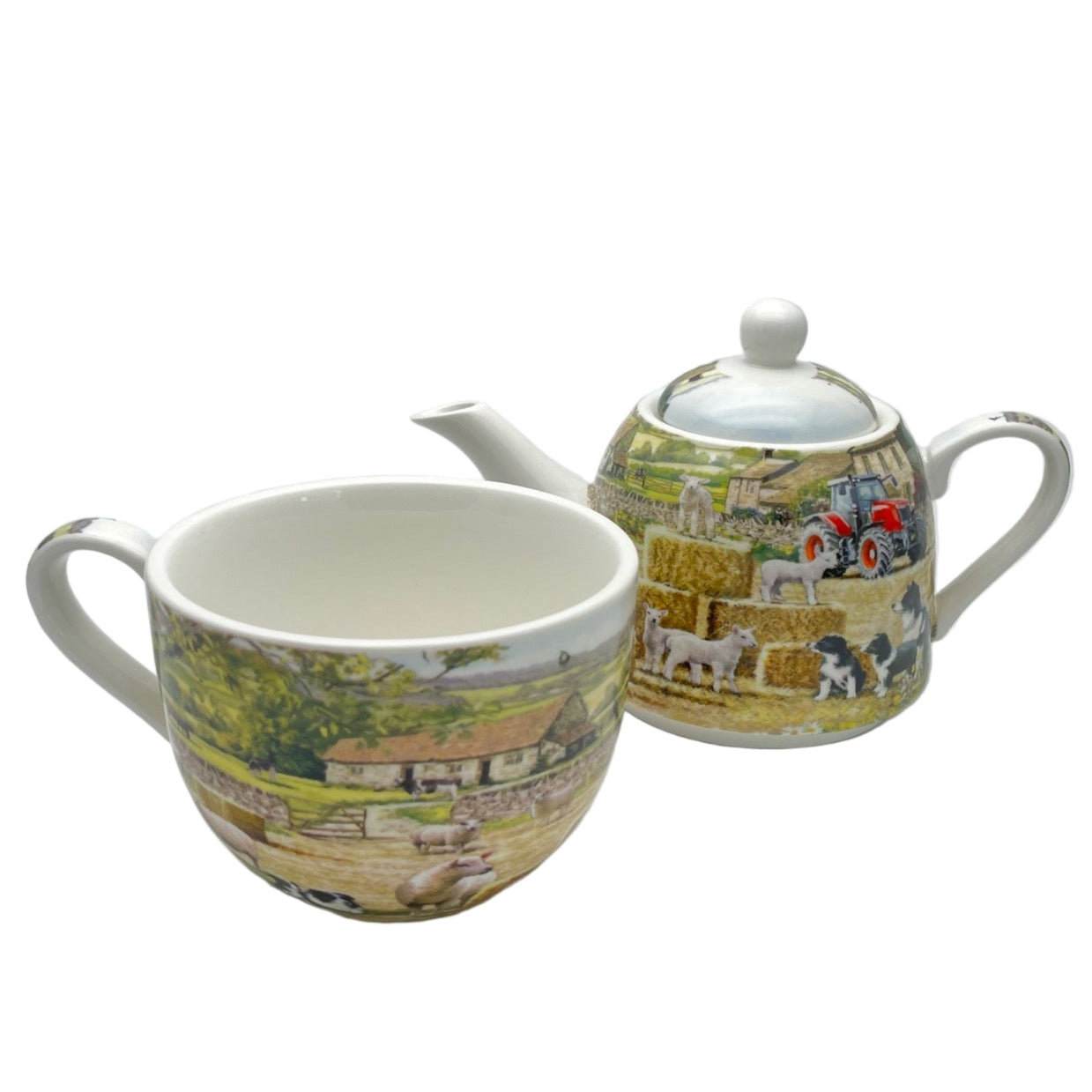 Teapot and mug set with scenic design on a white background