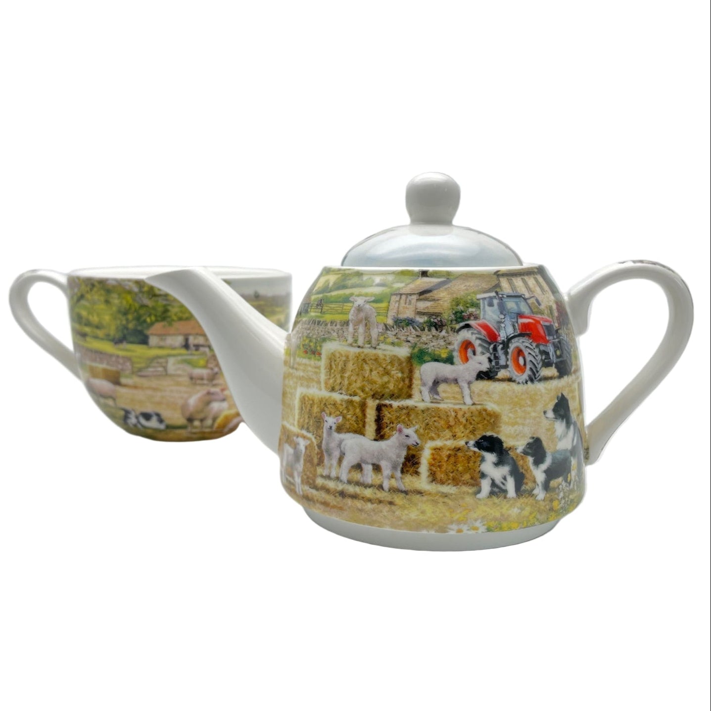 Teapot and mug set with farm scene design on a white background