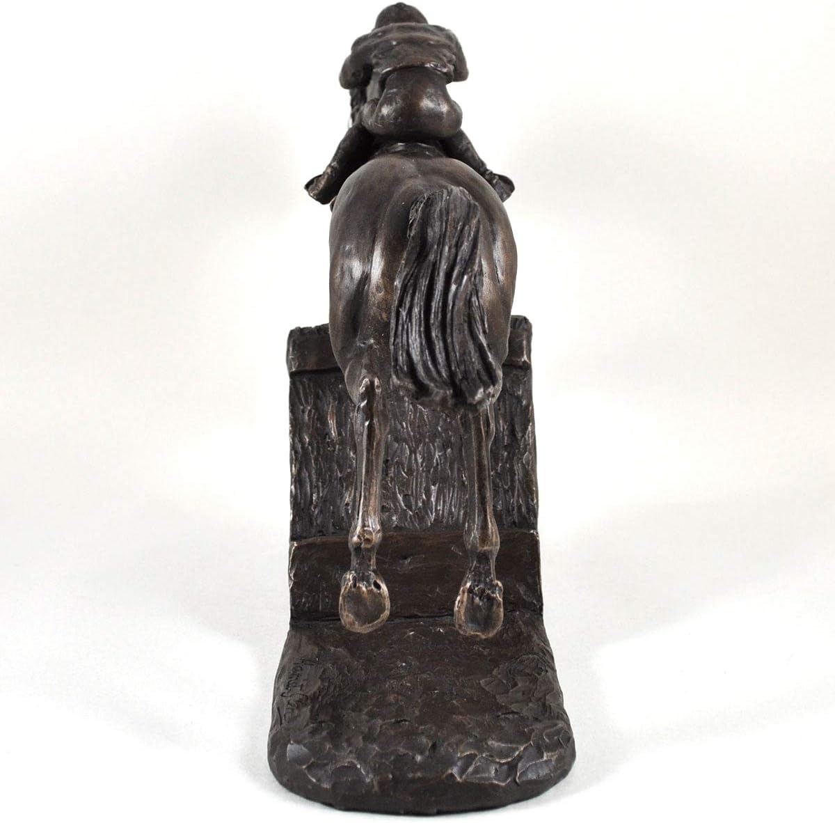 Bronze sculpture of a horse and rider on a white background