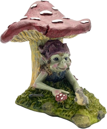Pixie figurine under a mushroom with a white background
