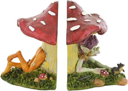 Mushroom-shaped bookends with pixie figure on a white background