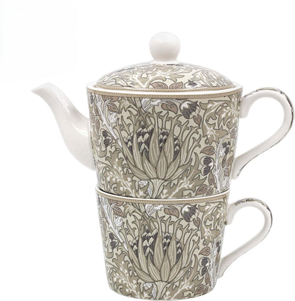 Teapot and mug set with floral pattern on a white background