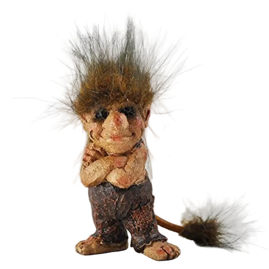 Small troll with spiky hair and a tail on a plain background