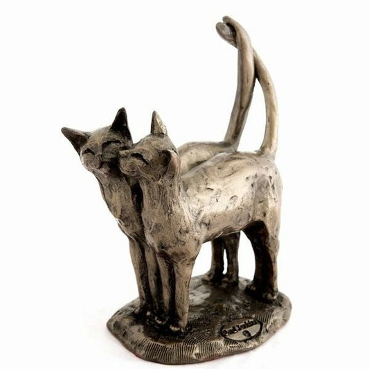 Bronze sculpture of two cats on a white background
